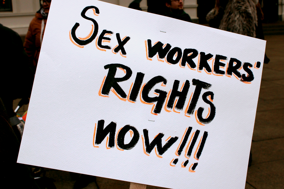 Plakat der det st&aring;r sex workers rights now