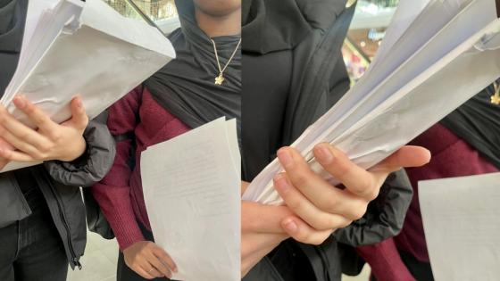 Salma (16) og Daniya (16) med CV og søknad de skal levere 