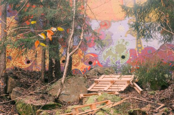 Veggmaleri med trær foran seg