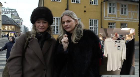 to jenter som ser p&aring; bildet av en hvit t-skjorte