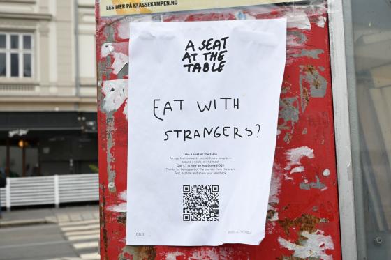 En plakat med ASATT sin QR kode
