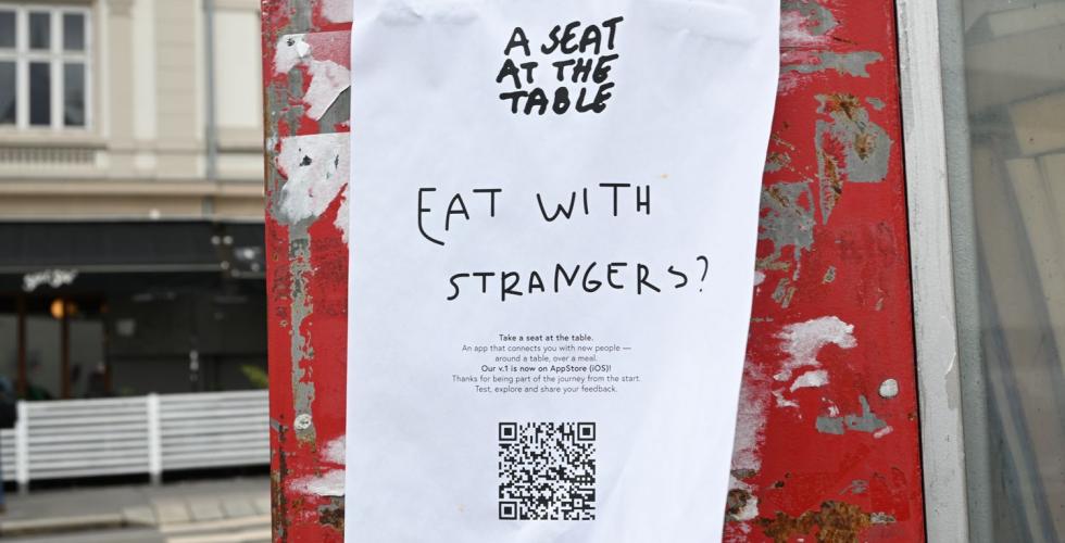 En plakat med ASATT sin QR kode