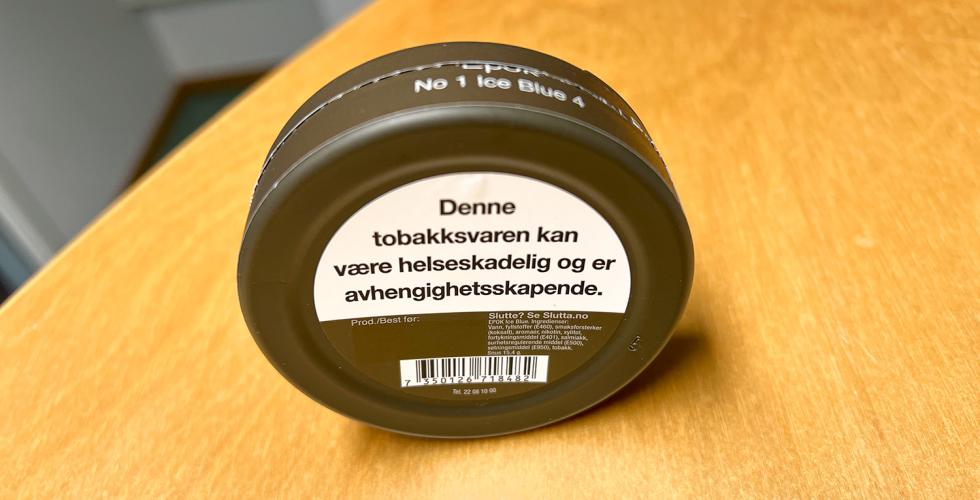 Baksiden av en snusboks