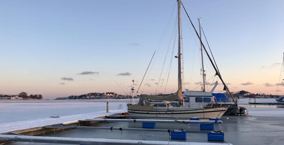 Teie båthavn i solnedgang